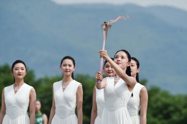 爱游戏APP-“亚”运观察①：杭州亚运，“迟到”的拥抱